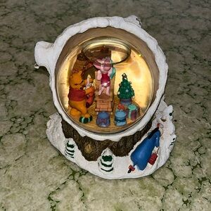 This Windy the Pooh Musical Christmas Globe.